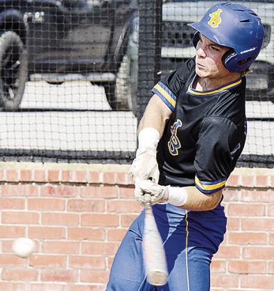 Beckett Southall swings with all his might at the ball during AB’s win over H-E. CDN | Sam Goodwyn