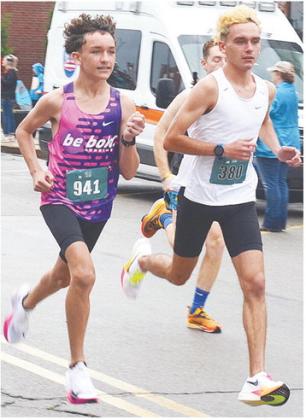 Clinton’s Bentlee, left, and Xadrian Hernandez take off from the starting line during the Clinton Classic Run Saturday morning. Bentlee took gold in the 5K race, while Xadrian finished first in the 10K race. CDN | Sam Goodwyn