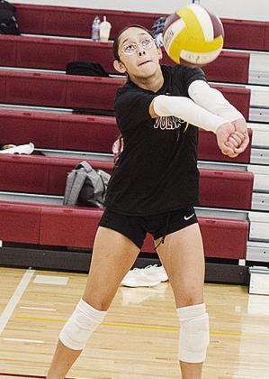 Jocelyn Lagunas hits the ball back over the net Thursday during a summer practice. CDN | Sam Goodwyn