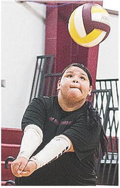 Aiyanna Bearshield focuses on the ball as she prepares to return it back over the net. CDN | Sam Goodwyn