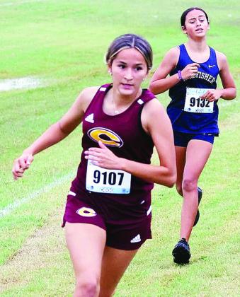 Emily Delarosa outruns her opponent from Kingfisher during the cross country meet in Kingfisher Saturday. CDN | Sam Goodwyn