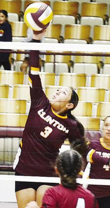 Clinton’s No. 3 Aliyah Lopez rises above the net to hit the ball back over to Weatherford during the Lady Reds’ home match against the Lady Eagles. CDN | Sam Goodwyn