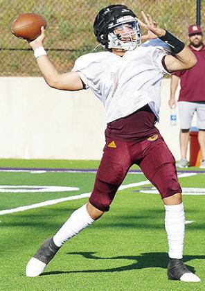 Sophomore quarterback Easten Powell aims the ball downfield as he prepares to throw it during Clinton’s scrimmage against Anadarko. CDN | Sam Goodwyn