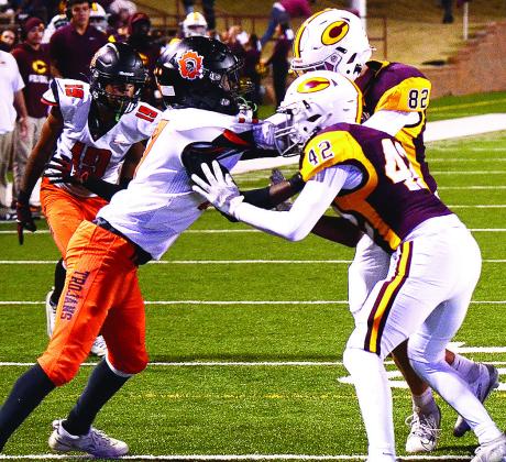 Clinton’s No. 42 CJ Begay and No. 82 Judd Hall block a defender during the Red Tornadoes’ game against the Trojans. CDN | Micah Ashcraft
