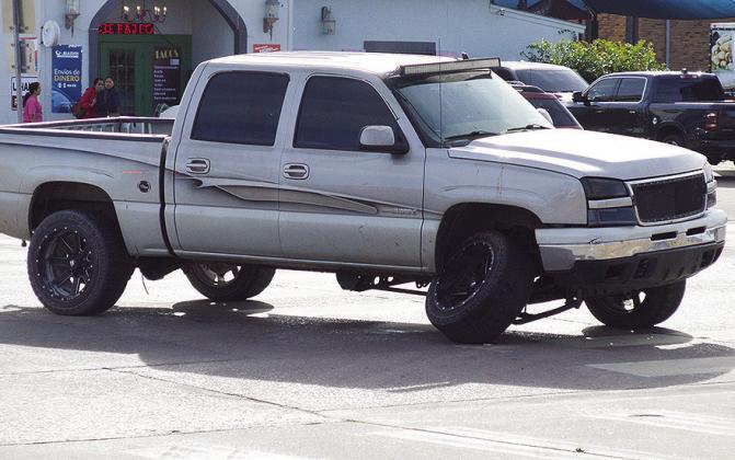 A pickup truck sits in the intersection of 10th Street and Gary Boulevard, after being involved in a collision involving another vehicle Tuesday afternoon. While medical first responders were at the scene, there were no injuries reported. CDN | Micah Ashc