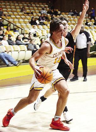 No. 13 Ethan Lofland drives to the basket against a Leopard during Clinton’s recent home contest against Lindsay. CDN | Sam Goodwyn