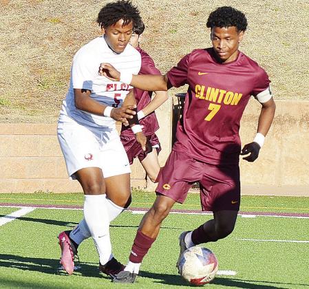 Clinton’s No. 7 Deontray Beavers battles with an Elgin defender during the Red Tornadoes’ home win over the Owls in the Tornado Bowl. CDN | Sam Goodwyn