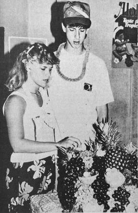 40 YEARS AGO Grads Marsha McKinsey and Duke Simmons examined an exotic fresh fruit concoction prepared by Sue Riggers during the seniors’ luau.