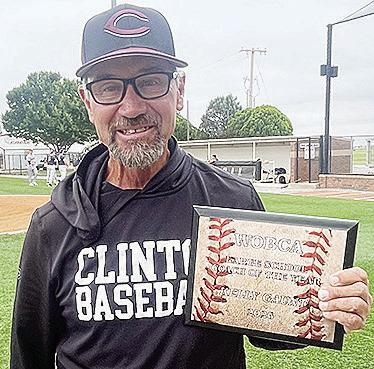 Recently retired Clinton baseball coach Kelly Gaunt shows off his Coach of the Year Award he was presented before the WOBCA All-Star Games Wednesday in Weatherford. CDN | Courtesy photo