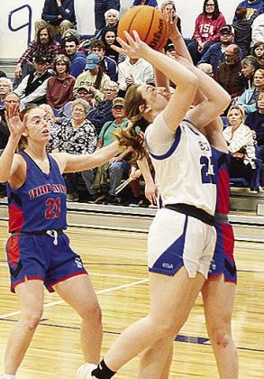 Corn Bible Academy’s Olivia Webb attempts a layup during the Lady Crusaders’ home win over the Sharon-Mutual Lady Trojans last week. CDN | Sam Goodwyn