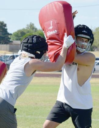 Reds football wraps up two-a-day practices