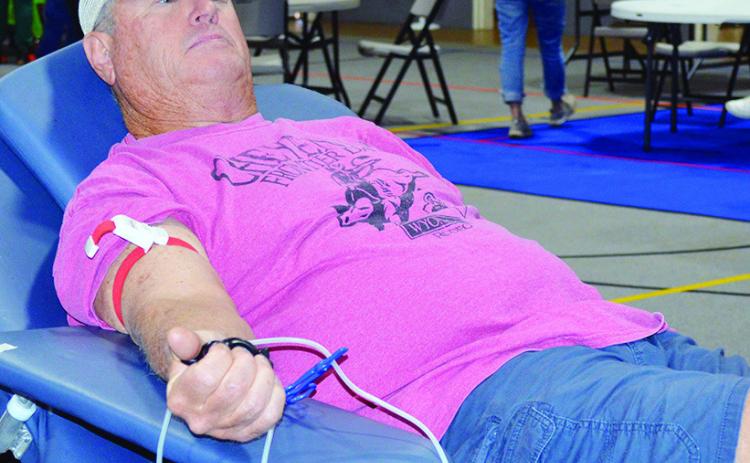 Billy Yarbrough donates blood to the Our Blood Institute blood drive at the First Christian Church Family Life Center. CDN | Christian Jacobsen