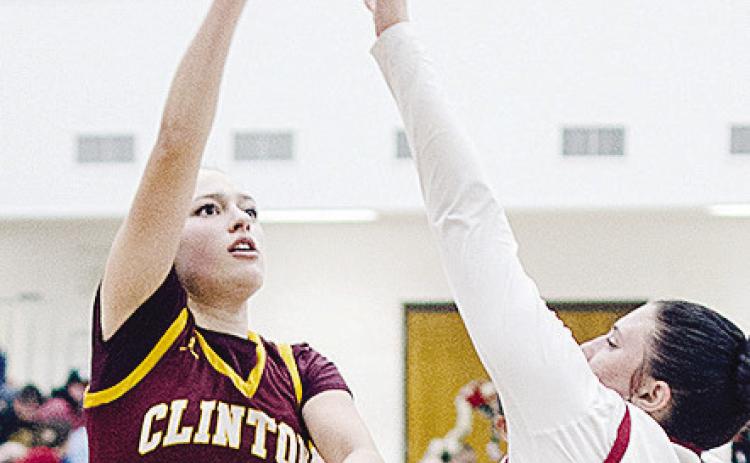 Clinton’s Paisley Ruyle passes the ball to an open teammate during the “Custer County Conflict” Tuesday in Weatherford. CDN | Sam Goodwyn