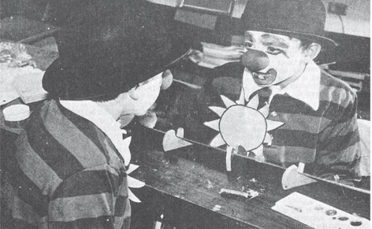 40 YEARS AGO Alone in clown character, Nance School fourth-grader Jason Jacoby studied his reflection in a mirror after getting some pointers in clown makeup from Mike Perkins Jr.