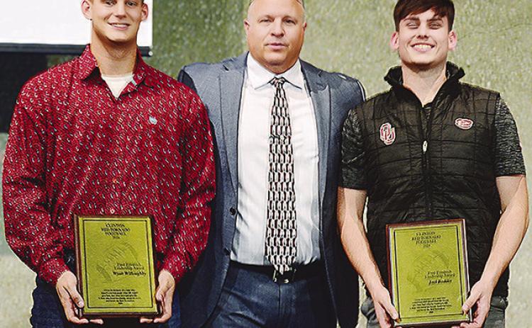 To end the annual football banquet, awards are handed out to deserving players. Pictured, from left, are Clinton’s Wyatt Willoughby, Coach John Higbee and Joel Badillo. Willoughby and Badillo were awarded the Fred Friedrich Award for this season. CDN |