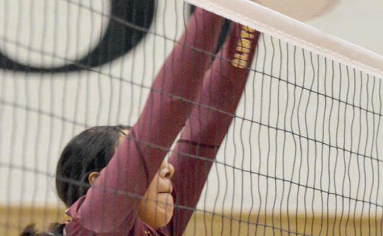 Lady Eagles claw the Lady Reds