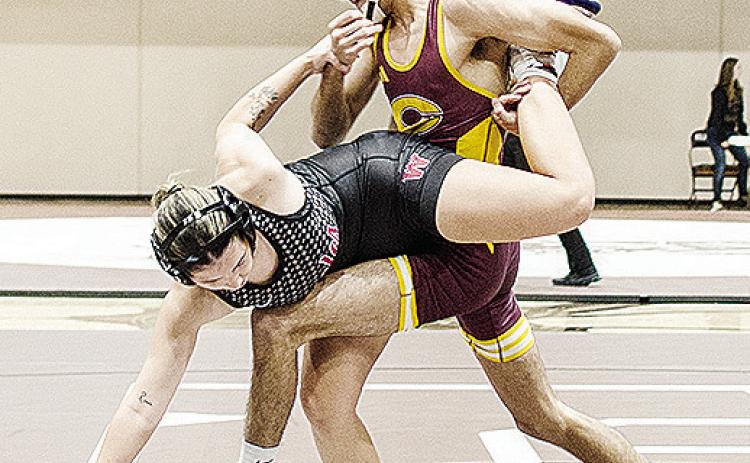 Clinton’s Brandon Rodriguez-Esclalante, right, performs a single leg takedown of his opponent during the Class 4A District 1 Duals Tuesday in Elk City. CDN | Sam Goodwyn