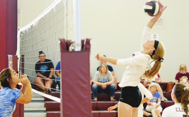 Clinton competes in scrimmage