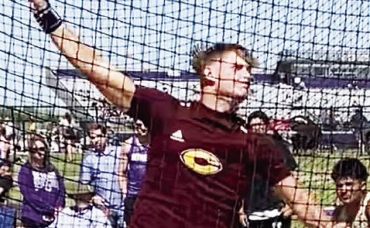 Clinton’s Wyatt Willoughby performs in the shot put Tuesday during the Western Conference Track Meet in Chickasha. CDN | Courtesy photo