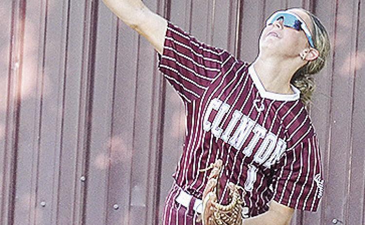 Clinton’s Olivia Cates hurls the ball in from right field during the Lady Reds’ home win Thursday over the OKC Lady Broncos on Senior Night. CDN | Sam Goodwyn