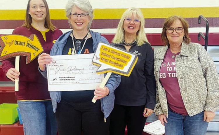 From left, Melissa Knabe, assistant superintendent; Jennifer Daubenspeck, grant winner; Debbie Carlisle, CPSF director; and Tonya Gaunt, CPSF director, celebrate Daubenspeck’s grant approval. CDN | Courtesy photo