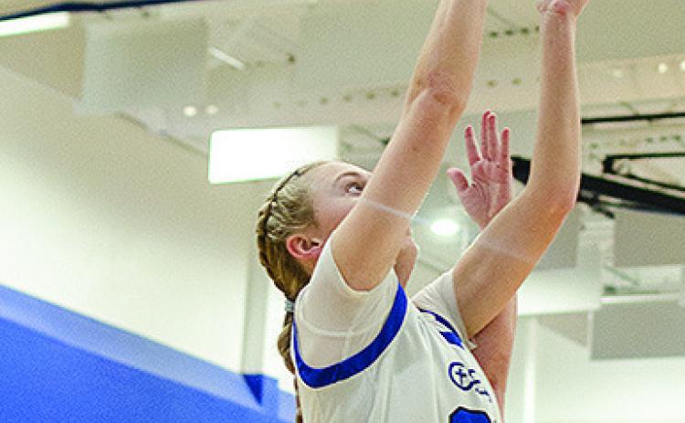 Corn Bible Academy’s Gretta Geisler goes up for the jump shot during the Lady Crusaders’ home win over Olustee-Eldorado. CDN | Sam Goodwyn