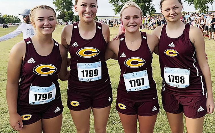 Clinton runners are all smiles after they competed in the Weatherford Cross Country meet over the weekend. Pictured, from left, are Laney Anderson, Paisley Ruyle, Baylor Moore and Aryana Pugh. CDN | Courtesy photo