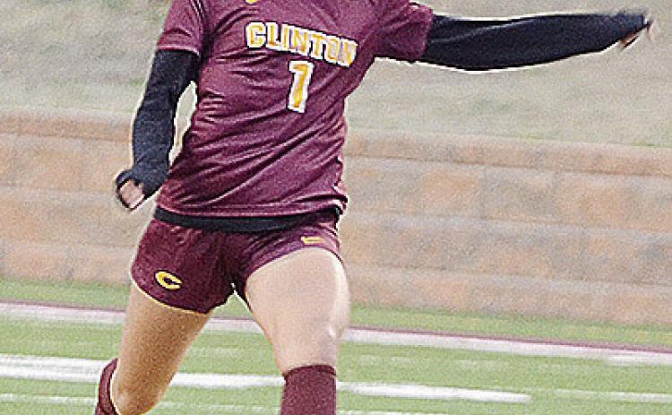 Clinton’s Alyvia Williams kicks the ball downfield in the Lady Reds’ season-opening win Tuesday against Southeast in the Tornado Bowl. CDN | Sam Goodwyn