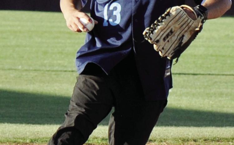 Ben Perez steps on the base for the out during the alumni game at Clinton’s baseball field Friday. CDN | Staff Photo