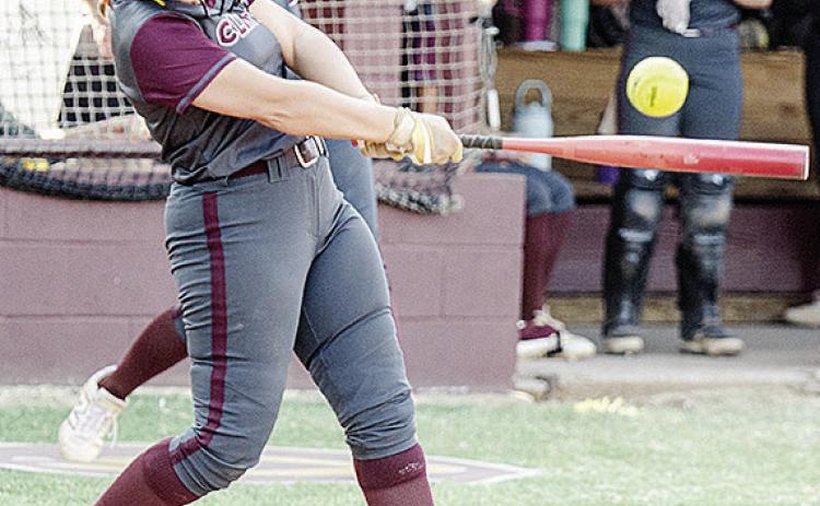 Clinton’s Emma Ray smacks the ball during the Lady Reds’ home game Thursday against Weatherford. CDN | Sam Goodwyn