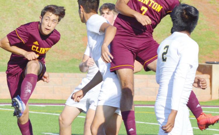 Clinton secures semifinal spots