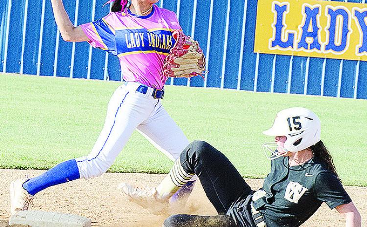 Arapaho-Butler’s Madi Lockhart tags the base before the runner arrives and hurls the ball to first for the double play during the Lady Indians’ win over Seiling. CDN | Sam Goodwyn