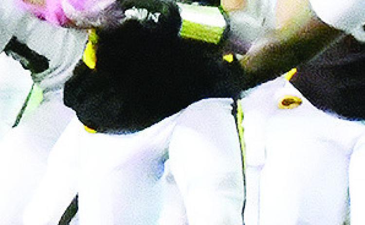 No. 5 Jesus Gutierrez holds on to the ball tight as he hustles away from Elk City defenders during Clinton’s win over the Elks in the Tornado Bowl Friday. CDN | John Kinsey
