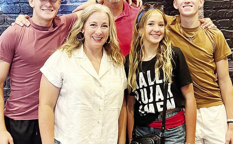 From left, Parker Adams, Erin Adams, Luke Adams, Leah Adams and Ryder Adams pose for a family photo during an outing. CDN | Courtesy photo