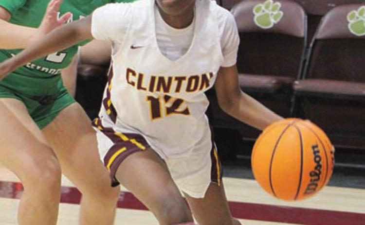 Lady Reds fend off Lady Whippets, 42-40