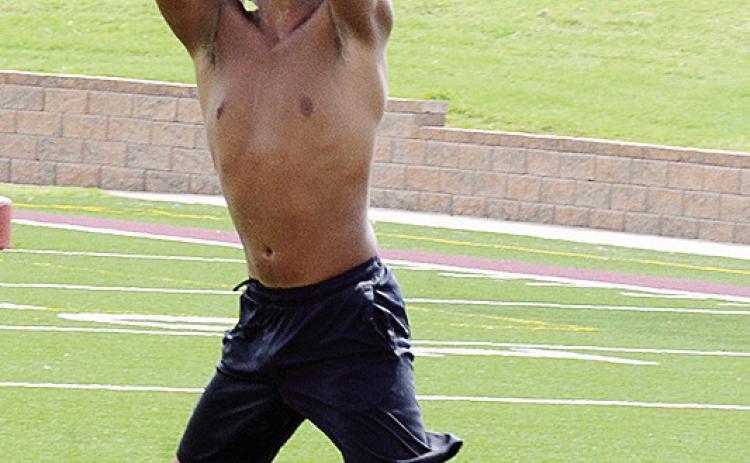 CJ Begay grabs the ball out of the air in an interception drill during practice. CDN | Sam Goodwyn