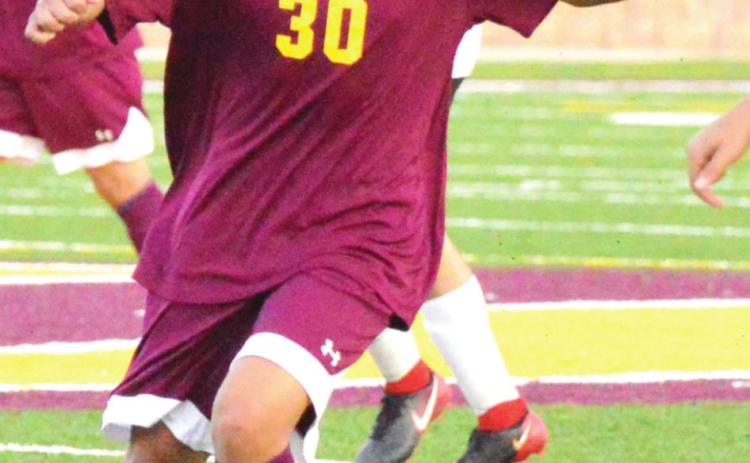 CHS soccer splits opener