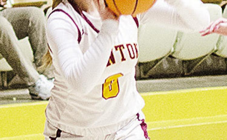 Clinton’s Laney Anderson squares to the basket as she prepares to shoot the ball during the Lady Reds’ home game against Woodward. CDN | Sam Goodwyn