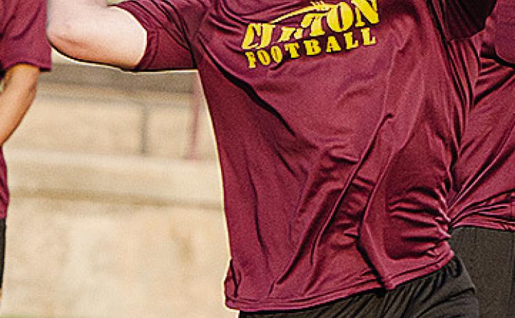 Freshman Liam Lofland pulls his arm back as he prepares to throw the ball during practice at the Tornado Bowl. CDN | Sam Goodwyn