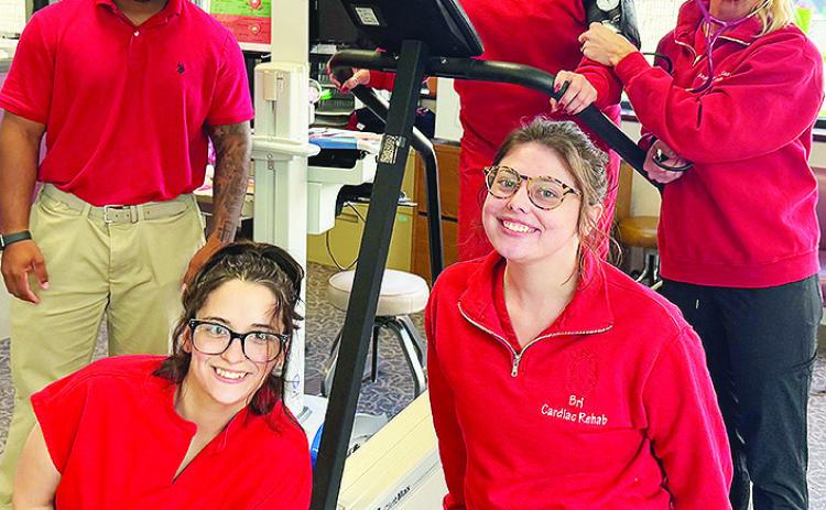 Front from left, Janie Arnett, Brianna Bowers; back, Daylan Thompson, Jina Kilpatrick, and Andrea Hammer smile while testing out equipment in the Cardiac Rehab Center at the hospital. CDN | Shiann Dawson