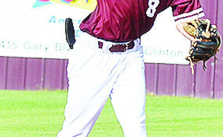 Clinton’s Jeter King throws the ball in during the Reds’ home game Tuesday against Elk City. CDN | Sam Goodwyn
