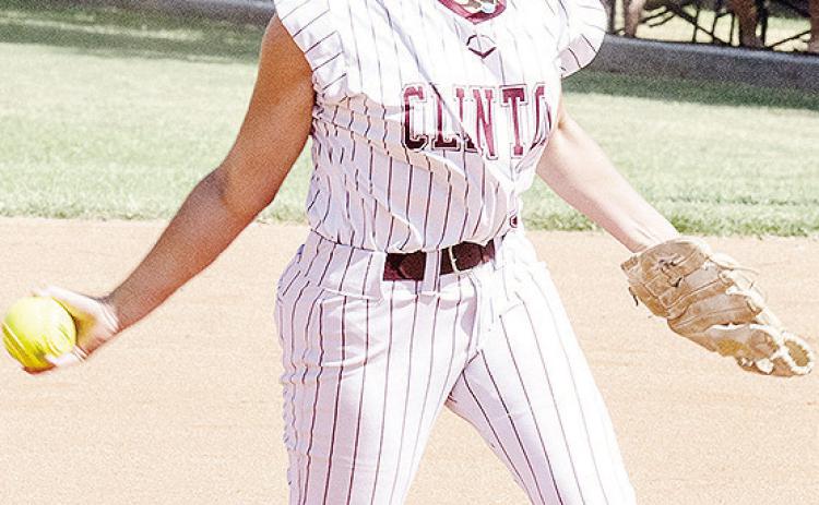 Clinton’s Hadley Meget hurls a pitch during the Lady Reds’ home win Thursday over Elk City. CDN | Sam Goodwyn
