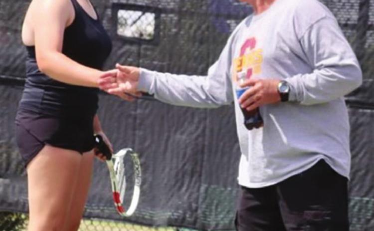 CHS tennis coach living his dream
