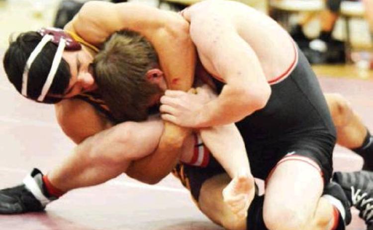 Clinton pins Geary six times for first win