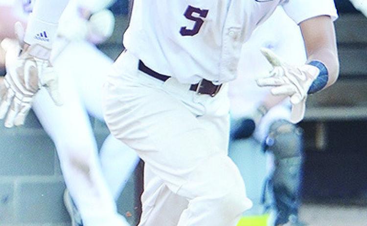 Taking care of buisness on both sides of the diamond