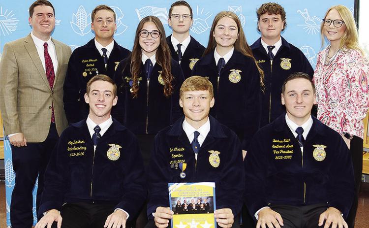 Front from left, Oklahoma FFA State Secretary Coy Davidson, Clinton FFA President Ben Christie, FFA Southwest Area Vice President Bonham Eslick; middle, Clinton FFA Vice President Madison Ashcraft, Clinton FFA Reporter Callie Griffith; back, Clinton Ag Te