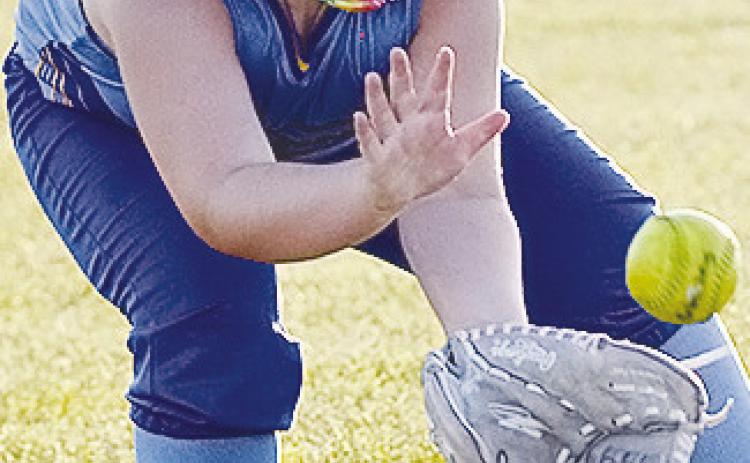 Arapaho-Butler’s Kynlee Brinkley focuses on the ball as she collects the ground ball during the Lady Indians’ first game of the OK Kids 8U State Softball Tournament Wednesday at Schumacher Fields at Acme Brick Park. CDN | Sam Goodwyn