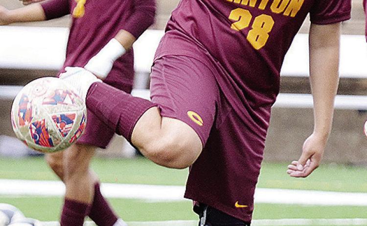 Clinton’s Kevin Ramriez juggles the ball with his foot during warmups prior to the Red Tornadoes’ match with Douglass in the Tornado Bowl. CDN | Sam Goodwyn