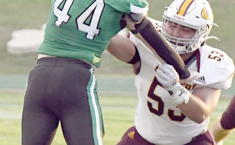 Holding his block