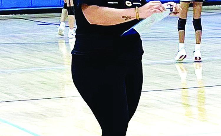 Acosta finds her own niche helping coach volleyball